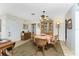 Charming dining room with wicker chairs and a round table at 2495 Tenth St, Englewood, FL 34224