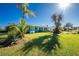 Charming home with lush landscaping and spacious front yard at 2495 Tenth St, Englewood, FL 34224