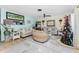 Bright and airy living room with coastal decor and comfortable seating at 2495 Tenth St, Englewood, FL 34224