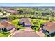 Single-Gathering home on a cul-de-sac lot with a circular driveway at 26852 Faldo Ln, Englewood, FL 34223