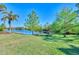 Private backyard oasis with pond view at 26852 Faldo Ln, Englewood, FL 34223