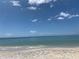Peaceful beach scene with clear sky and ocean waves at 26852 Faldo Ln, Englewood, FL 34223