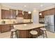 Updated kitchen with stainless steel appliances and an island at 26852 Faldo Ln, Englewood, FL 34223