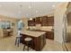 Modern kitchen with stainless steel appliances and island at 26852 Faldo Ln, Englewood, FL 34223