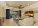 Spacious living area with view of pool and preserve at 26852 Faldo Ln, Englewood, FL 34223