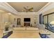 Spacious living room with ample natural light and comfortable seating at 26852 Faldo Ln, Englewood, FL 34223
