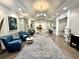 Bright and spacious lobby with comfortable seating and elegant decor at 26852 Faldo Ln, Englewood, FL 34223