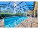 Enjoy this large refreshing pool and screened enclosure at 26852 Faldo Ln, Englewood, FL 34223