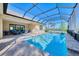 Inviting, refreshing pool with screened enclosure at 26852 Faldo Ln, Englewood, FL 34223