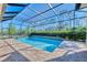 Screened pool and patio area with beautiful preserve views at 26852 Faldo Ln, Englewood, FL 34223