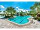Community pool with lap lanes and plenty of lounge space at 26852 Faldo Ln, Englewood, FL 34223