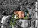 Bird's-eye view of the house and surrounding landscape at 3117 Silkwood Ln, Port Charlotte, FL 33953