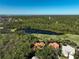 Aerial view of the property showcasing the home and its surroundings at 3117 Silkwood Ln, Port Charlotte, FL 33953