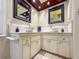 Elegant bathroom with double sinks, modern fixtures, and a spacious feel at 3117 Silkwood Ln, Port Charlotte, FL 33953