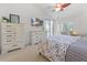 Bright bedroom with a king-size bed, TV, and plenty of storage at 3117 Silkwood Ln, Port Charlotte, FL 33953