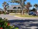 Riverwood Golf Club's clubhouse exterior, showcasing its architectural design at 3117 Silkwood Ln, Port Charlotte, FL 33953