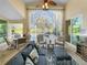 Spacious lanai with comfortable seating, overlooking the pool and spa at 3117 Silkwood Ln, Port Charlotte, FL 33953