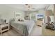 Serene bedroom with nautical accents, soft lighting, and comfortable queen bed at 4036 Elvington Rd, Port Charlotte, FL 33981