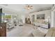 Bright living room featuring vaulted ceilings, neutral decor, and natural light at 4036 Elvington Rd, Port Charlotte, FL 33981