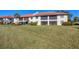 Well-maintained building with grassy backyard at 520 Pine Hollow Cir # 520, Englewood, FL 34223