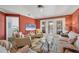 Living room with hardwood floors and access to other rooms at 520 Pine Hollow Cir # 520, Englewood, FL 34223