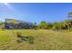 Expansive backyard and fire pit at 6096 Bowie Ln, Englewood, FL 34224