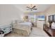 Bright bedroom with a comfortable bed and plenty of closet space at 6096 Bowie Ln, Englewood, FL 34224