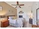 Cozy bedroom with a king-size bed and plenty of natural light at 6096 Bowie Ln, Englewood, FL 34224