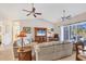Spacious living room with vaulted ceilings and plenty of natural light at 6096 Bowie Ln, Englewood, FL 34224
