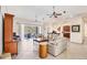 Bright living room with vaulted ceilings and access to the backyard at 6096 Bowie Ln, Englewood, FL 34224
