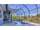 Screened pool and spa with patio area at 6096 Bowie Ln, Englewood, FL 34224