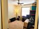 Empty bedroom with carpet, ceiling fan, and boxes at 6358 Granger Rd, Port Charlotte, FL 33981
