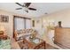 Bright living room with bar, comfortable seating, and an open layout, ideal for entertaining at 6358 Granger Rd, Port Charlotte, FL 33981