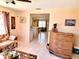 Well-lit living area with tile floors, a cozy seating area, and an open layout, perfect for relaxation at 6358 Granger Rd, Port Charlotte, FL 33981