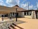 Recreation center patio with stonework and seating at 6358 Granger Rd, Port Charlotte, FL 33981