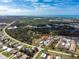 Aerial view showing property location and surrounding area at 6796 Gasparilla Pines Blvd # 7, Englewood, FL 34224