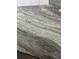 Close-up of a countertop with a beautiful swirling pattern of gray and white at 7320 Freeberg Cir, Port Charlotte, FL 33981