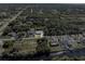 Aerial view of a single Gathering home near the water at 9487 Prospect Ave, Englewood, FL 34224