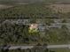 Aerial view showing home's location along waterway and neighborhood at 9487 Prospect Ave, Englewood, FL 34224