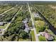 Wide aerial showcasing the home's location and surrounding community at 9487 Prospect Ave, Englewood, FL 34224