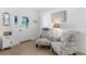 Inviting entryway with two patterned armchairs and a side table at 9487 Prospect Ave, Englewood, FL 34224