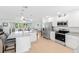 Bright kitchen featuring stainless steel appliances and island at 9487 Prospect Ave, Englewood, FL 34224