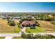 Single-story house with large lot and neighborhood context at 109 Bonita Dr, Rotonda West, FL 33947