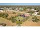 Aerial view of a home with pool and large lot, surrounded by lush landscaping at 109 Bonita Dr, Rotonda West, FL 33947