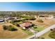 Aerial view of a single-Gathering house with a large backyard at 109 Bonita Dr, Rotonda West, FL 33947