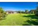 Expansive grassy backyard, perfect for outdoor fun at 109 Bonita Dr, Rotonda West, FL 33947