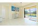 Bright breakfast room with pool and backyard view at 109 Bonita Dr, Rotonda West, FL 33947