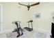 Home gym with a treadmill and exercise machine at 109 Bonita Dr, Rotonda West, FL 33947