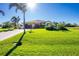 Single-story house with attached garage and lush landscaping at 109 Bonita Dr, Rotonda West, FL 33947