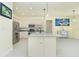 Modern kitchen with stainless steel appliances and granite countertops at 109 Bonita Dr, Rotonda West, FL 33947